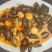 Seafood Pescatore · Mussels, clams, calamari, shrimp, and scallops in a white or red sauce. Served over pasta.