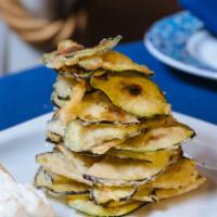 Estia Chips · Vegetarian. Thinly sliced eggplant and zucchini lightly fried served with tzatziki.