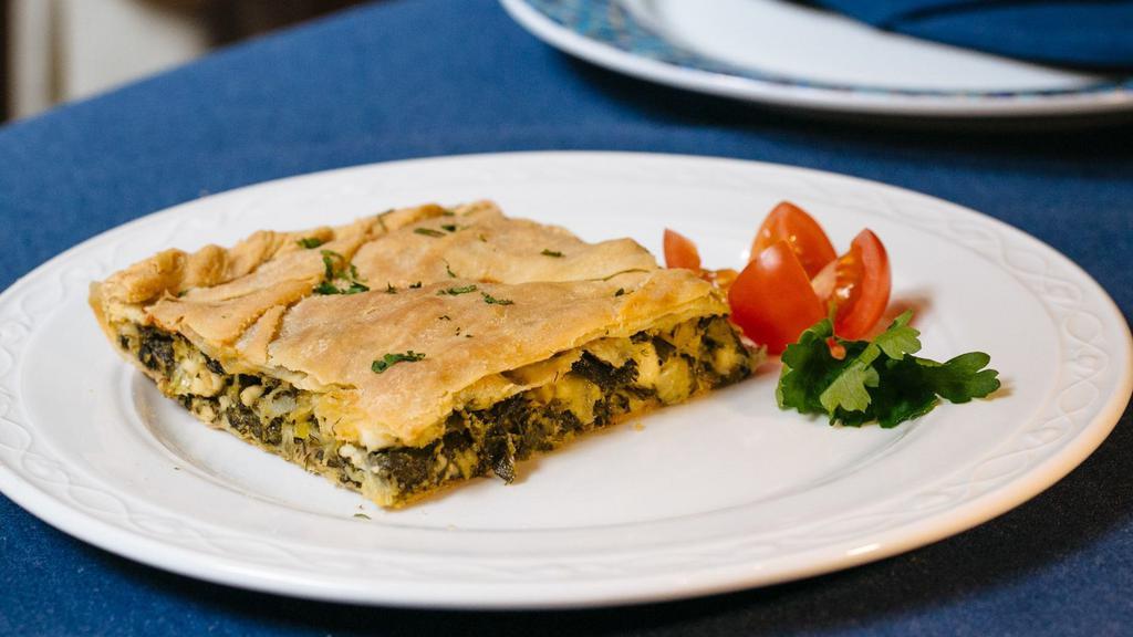 Spanakopita · Vegetarian. Leeks, scallions, dill, spinach, and feta baked in house-made phyllo dough.