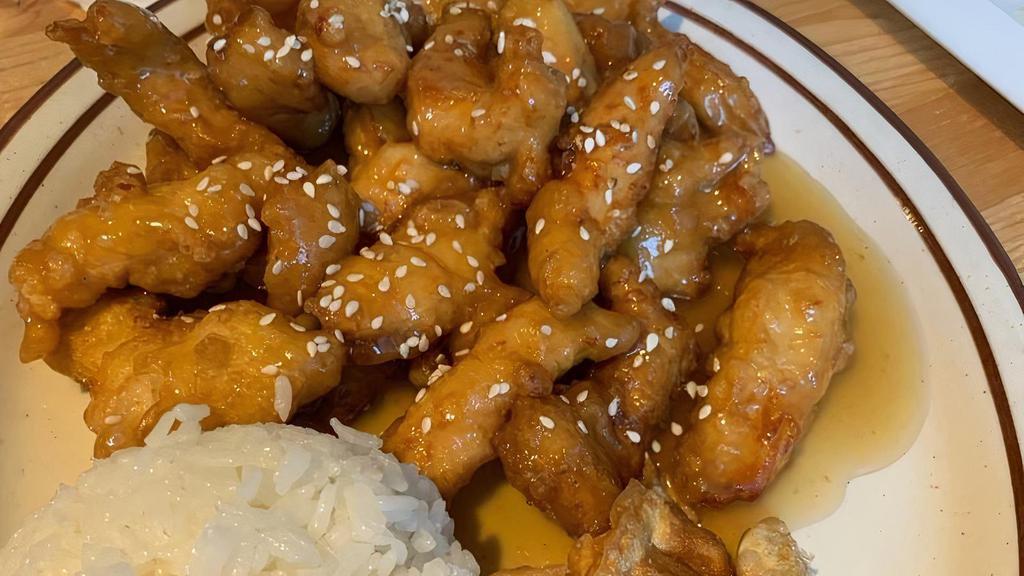 S&S Orange Chicken · Comes with 2 pieces potstickers and 4 piece sushi roll.