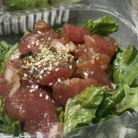 **Hawaiian Poke (8 Oz) · Raw fish

**this item may contain raw or uncooked ingredients or may be cooked to order.  Co...