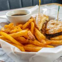 French Dip Sandwich · Philly meat with provolone served on a toasted hoagie and au jus with a side of locals chips...