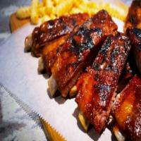 (9) 12 Bbq Ribs And 12 Chicken Wings · Comes with 12 BBQ Ribs and 12 Chicken Wings, served with 4 large side dishes and choice of b...