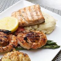 Mixed Seafood Grill · Comes with grilled salmon, jumbo shrimp, crab cake and scallops, served with two side dishes...