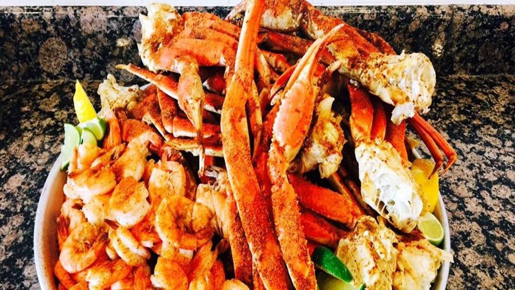 (Special)4 Pounds Of Crab Legs With Steamed Shrimp, Corn On The Cob And Potato Salad(Medium) · Deliciously sweet and tender, our juicy Alaskan Snow Crab legs!
Buy 4 pounds of Crab Legs and Get Half pound of Steamed Shrimp, Corn on the cob, and Potato Salad(Medium) Free! Served with melted butter on the side.