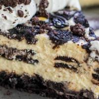 Oreo Cheesecake · This oreo cheesecake is thick, creamy and filled with cookies and cream