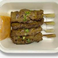 Beef Satay · marinated beef on skewer, peanut sauce, sweet & sour sauce (GF)