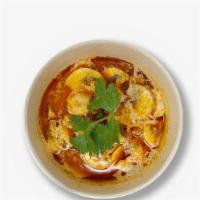 Tom Yum Coconut Soup · chili paste, lime, coconut milk, mushroom, cilantro , galangal, lemongrass, kaffir lime leaf