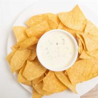White Queso · Served with corn tortilla chips. (dairy, gluten)