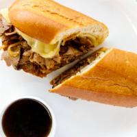 French Dip · Thin sliced roast beef grilled with sautéed onions topped with swiss cheese on a toasted hoa...