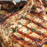 Cajun Grilled Pork Chops (2) With 2 Sides · Tender and juicy grilled pork chops. Served with two side dishes and choice of bread on the ...