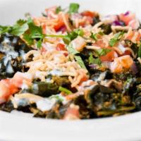 Spinach Chat · Crispy baby spinach topped with homemade cilantro, tamarind, and chef's special white sauce ...