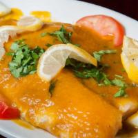Fish Masala  · Tilapia fish cooked with fresh tomato, onion, ginger, and authentic curry sauce.