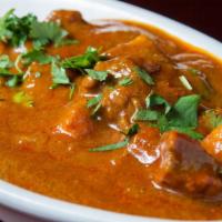 Lamb Or Beef Vindaloo · A spicy goan specialty, a delicious combination of meat marinated in vinegar, hot peppers, a...