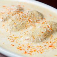 Malai Kofta · Fried balls of minced vegetables, herbs, and nuts simmered in a cream sauce