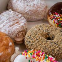 1/2 Dozen Assorted Donuts · House choice of our most popular donuts available upon ordering.