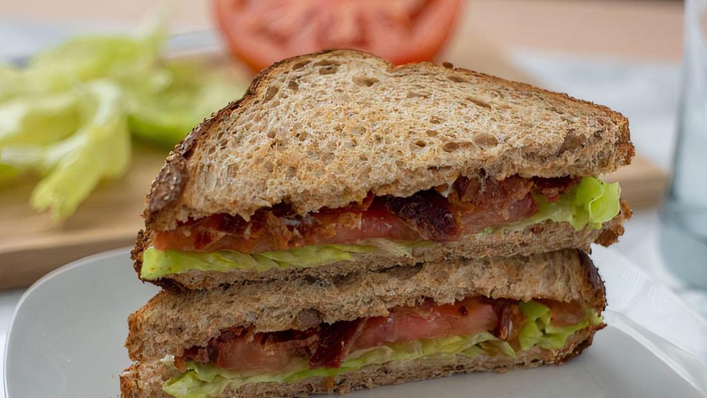 Jj  Blt · Enjoy a BLT sandwich. Served with crispy bacon, fresh chopped lettuce and tomatoes. Your choice of white, wheat or rye bread.