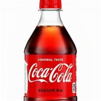 Coke · 20 ounce bottle of Coke. 240 calories