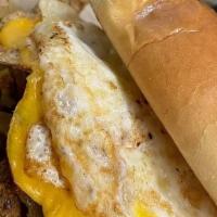 Breakfast Sandwich · Two fresh fried hard eggs(salt &Pepper), topped with American cheese, and your choice of mea...