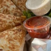 Quesadilla · Savory grilled meat, and five blend melted cheese on a large flour tortilla. (Quesadillas do...
