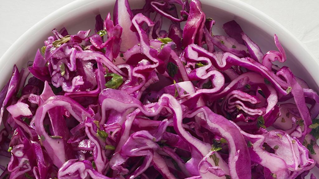 Red Cabbage Slaw · 8oz's of house-made blend of red cabbage, dried mint, herbs and lemon juice