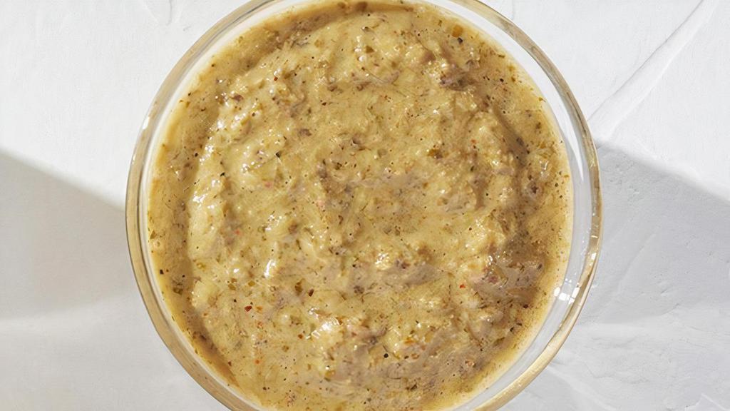 Falafel Chutney Tahini · Cilantro’s the star of this show. Jalapenos bring the kick, tahini cools it down. Green, earthy, and slightly spicy.