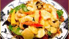 Seafood In Bird'S Nest · Jumbo shrimp, scallop, lobster meat stir fried with mixed vegetables in white sauce with pan...