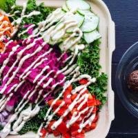 Kalefornia Love · Marinated Kale, Pickled Cabbage, Carrots, Cucumbers, Red Bell Pepper, Red Onion, Cashew Chee...