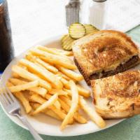 Patty Melt · Hamburger with sauteed onion and melted Swiss cheese on grilled rye bread.