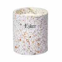 Plantable Candle · Esker. 
This hand-poured, soy-based candle is a natural blend of Palo Santo, Rock Rose and C...