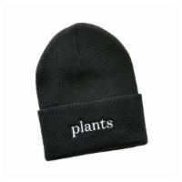Plants Beanie · Stay nice and toasty with our Plants Beanie. Black knitted beanie with ‘plants’ in contrasti...