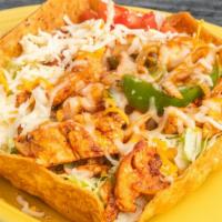 Fajita Salad · Your choice of chicken, steak or shrimp sautéed with peppers and onions over lettuce, diced ...