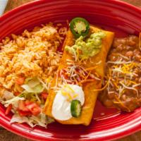 Fajitas Chimichanga · Sautéed chicken, beef or shrimp, with peppers and onions, topped with sour cream, guacamole,...