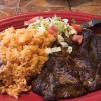 Carne Asada · Marinated sirloin steak, with your choice of plain or cooked in salsa with peppers and onions.