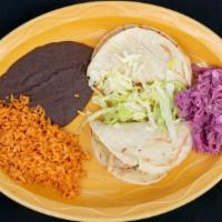 Soft Tacos · Soft corn tortillas filled with choice of chicken, beef, or beans melted cheese and lettuce.