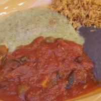 Chiles Rellenos · Green chiles stuffed with cheese, topped with choice of green  tomatillo salsa, or tomato-mu...