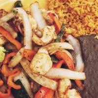 Chicken Fajitas · Stir fry with peppers and onions, served with guacamole.