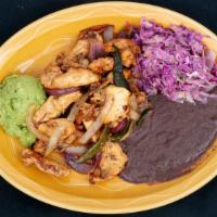 Fajitas De Pollo · Marinated chicken strips grilled with peppers and onions, served with three flour tortillas ...