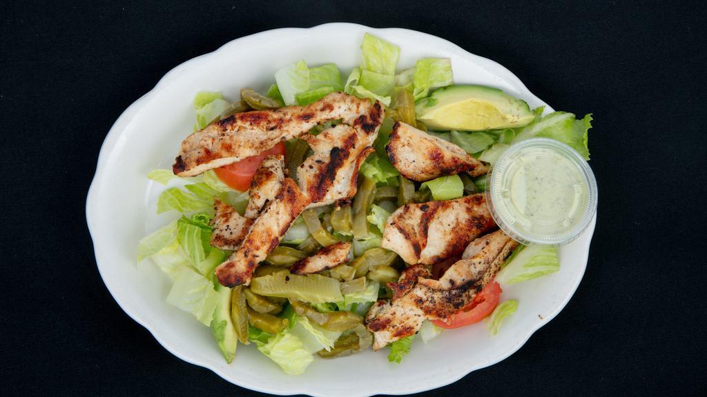 Pollo A La Parilla · Grilled chicken breast topped with our cheese blend and sliced serrano pepper.