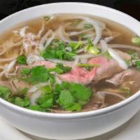 Pho Tai (Beef Noodle Soup With Sliced Rare Eye Round) · Beef noodle soup with sliced rare eye round.