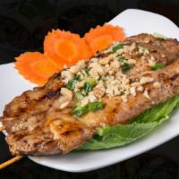Ga Lui (Chicken Teriyaki) · 2 pieces of chicken teriyaki marinated in garlic, black pepper, lemongrass, sesame and soy s...