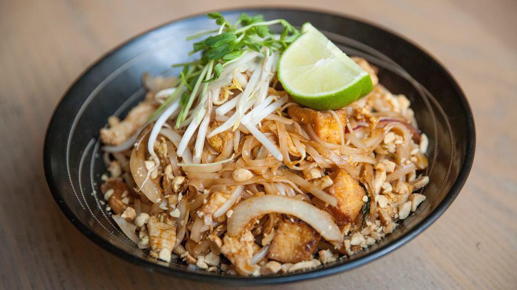 Pad Thai  · Tender Chicken, Bean Sprouts, Peanuts, Egg, Traditional Sauce, Rice Noodles, Thai Basil, Julienne Vegetable