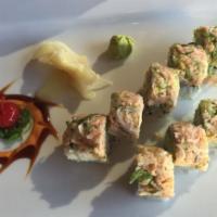 California Dynamite · California roll topped with cooked salmon, white fish, crabmeat and seaweed salad.