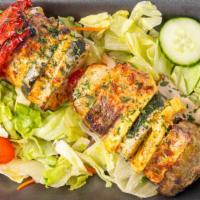 Sword Fish Kebob · A delicious skewer of fresh pieces of sword fish, mixed vegetables, marinated in our paprika...