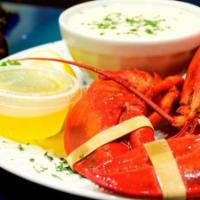 Steamed Lobster · Cooked in boiling water and served with melted butter, corn on the cob and lemon. Be ready t...