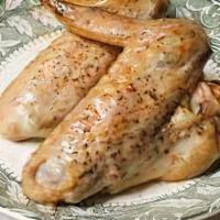 Turkey Wings · Cooked wing of a chicken coated in sauce or seasoning.