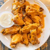 Wings · Deep-fried chicken wings with your choice of sauce.