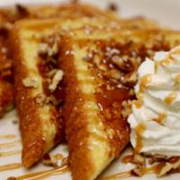Salted Caramel French Toast · 3 slices Texas French Toast topped with Ghirardelli salted caramel sauce, pecans and whipped...