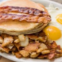  John'S Big Breakfast · Two pancakes, two XL eggs, two slices of bacon, and home fries.

Consuming raw or under cook...