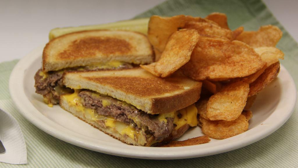 The Patti Melt · 1/4 lb certified angus steak  burger on Grilled Rye with cheese, fried onions and french fries